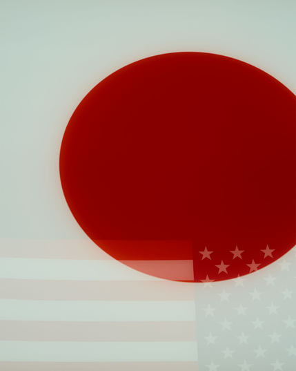 日本国旗に星条旗が映り込んでいる。